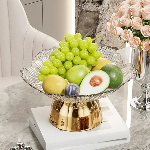 Fruteira de mesa em formato de pétala dourada com design de folhagens